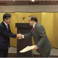 Mr. Gerard Sanvictores (R) receiving the Certificate of Commendation from Ambassador Kazuhide Ishikawa (L)