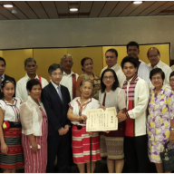 The family and friends of Dr. Mahowo who attended the conferment ceremony pose with Ambassador Ishikawa.  To the left of Atty. Tet Mahiwo is their only son, Asa Mahiwo who is now a freshman at the University of the Philippines.