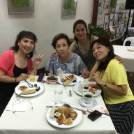 Mrs. Nakayama, Mrs. Haruko Murakami, Mrs. Teresita Ono and Mrs. Noriko Maruhashi eating their merienda.